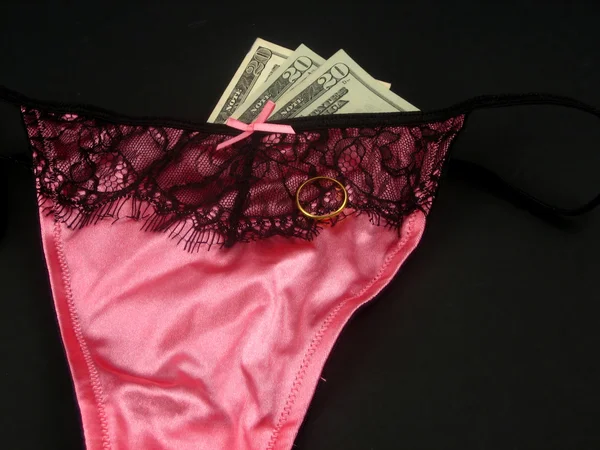 Сексуальное белье и деньги — стоковое фото