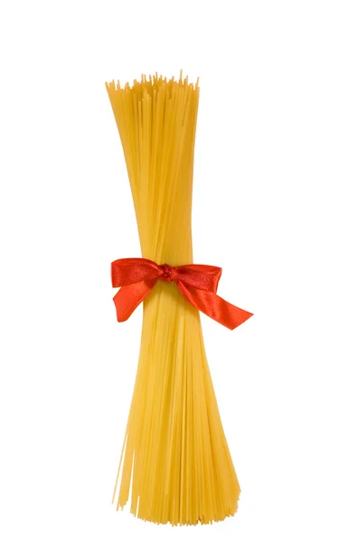 Poros spageti dengan busur merah, terisolasi Stok Foto Bebas Royalti