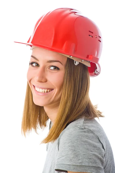 Vrouw bouwer in oranje helm Stockfoto
