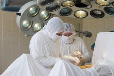 Surgeon team at work clipart