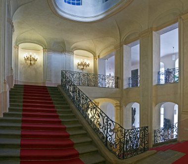 Ancient staircase with red carpet clipart