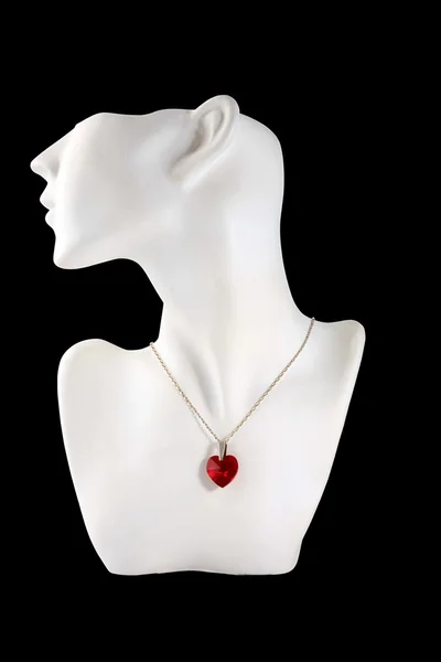Necklace and mannequin on black — Stock Photo, Image