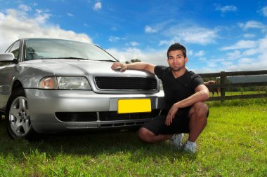 Man beside car in afternoon sun clipart