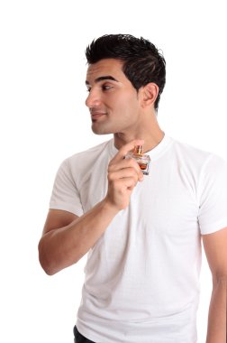 Man spraying perfume cologne to his neck clipart