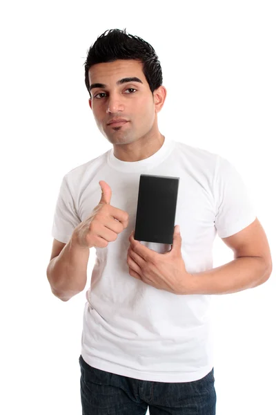 Guy showing product thumbs up Royalty Free Stock Images