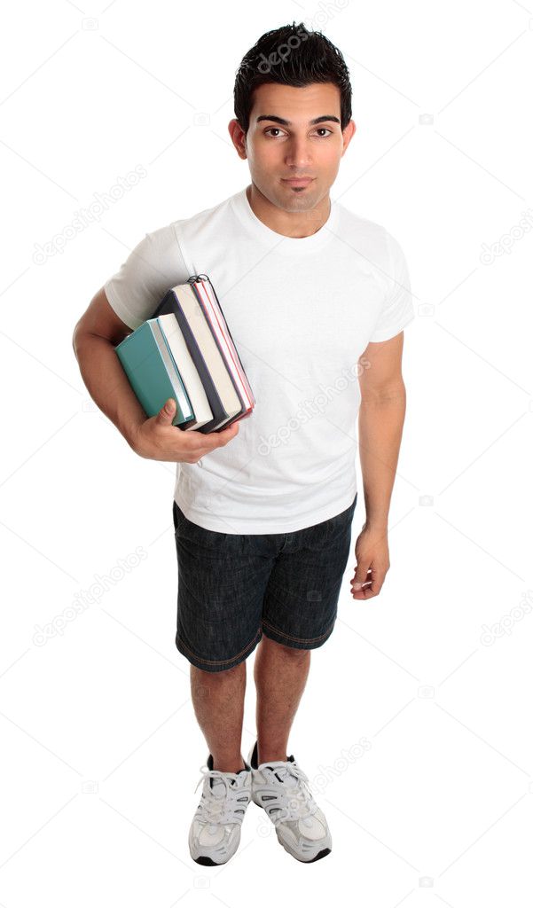 College student standing with textbooks