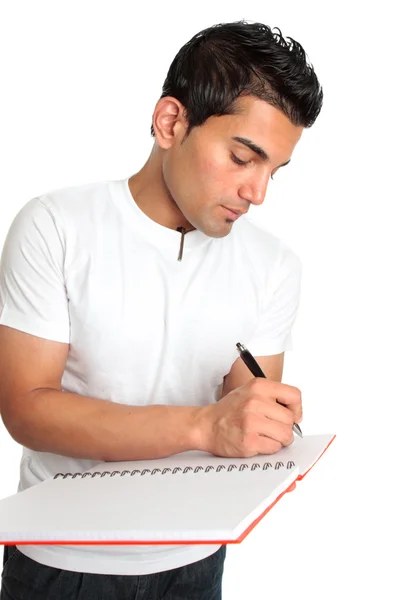 Mann oder Student schreibt in ein Notizbuch — Stockfoto