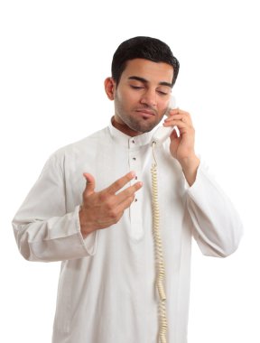 Middle eastern arab businessman on phone clipart