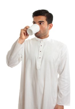 Arab man drinking coffee clipart