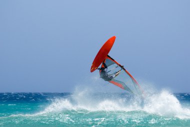 Acrobatic surfer clipart