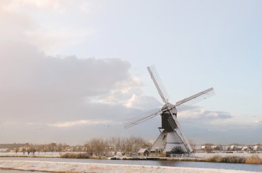 Windmill in wintertime clipart