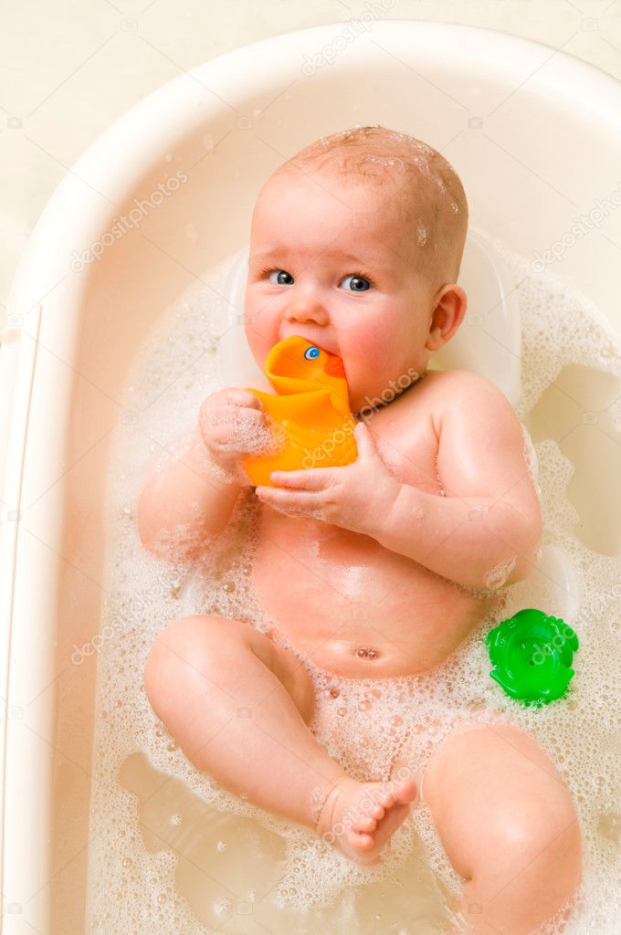 Baby with rubber-duck