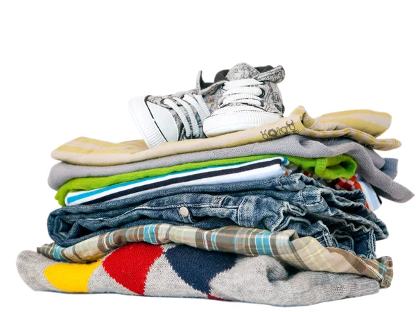 Pile of boys clothes isolated on white — Stock Photo, Image