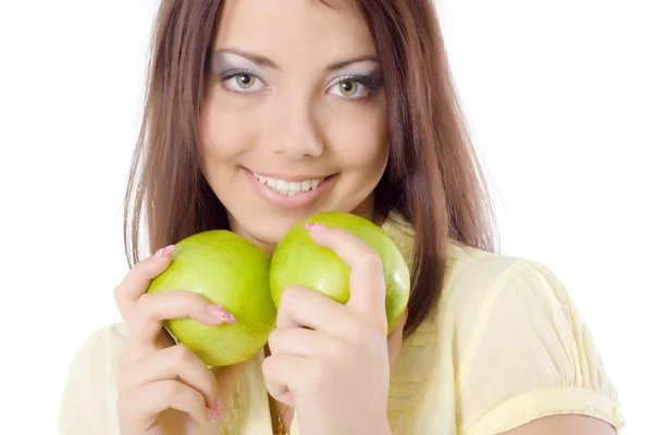 Девушка с зелеными яблоками — стоковое фото