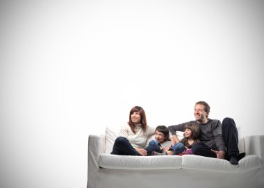Family on couch clipart