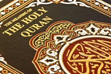 Closeup of the Holy Quran book clipart