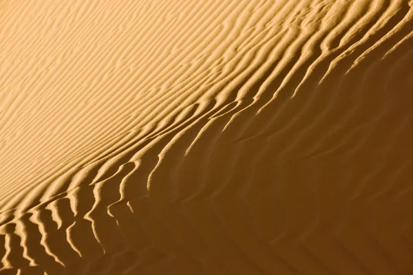 रेगिस्तान रेत पैटर्न का क्लोजअप — स्टॉक फ़ोटो, इमेज