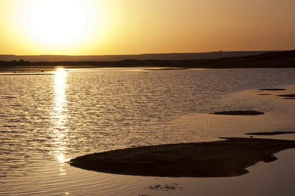 stock image Sunrise at a lake in the desert