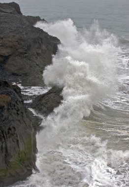 Iceland's crashing waves clipart