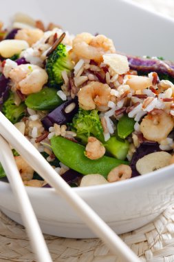 Wild rice with vegetables and prawns clipart