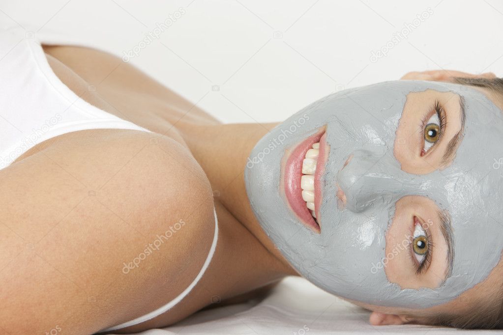 Portrait of woman with facial mask