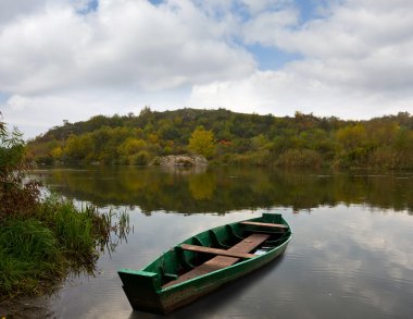 Boat on river clipart