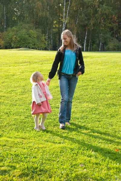 Young mother and daughter playing — Stock Photo, Image