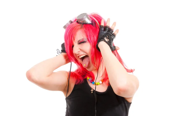 Punk girl listens to music — Stock Photo, Image