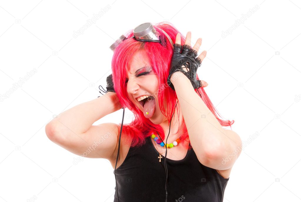 Punk girl listens to music