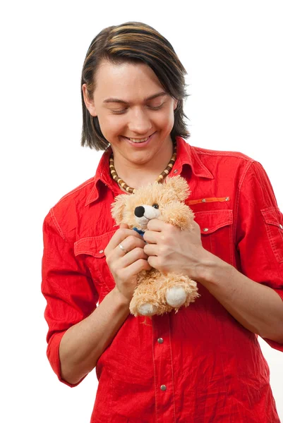 Молодой парень со своей любимой игрушкой — стоковое фото