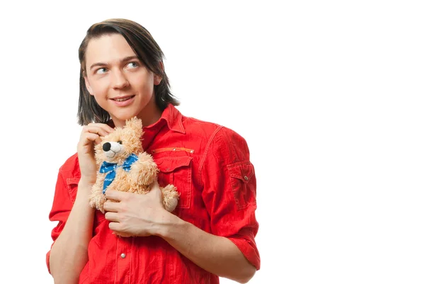 Молодий хлопець зі своєю коханою іграшкою — стокове фото