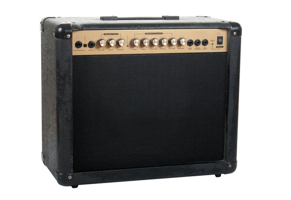 Handheld guitar amplifier isolated over white background in studio. Clipping path included.