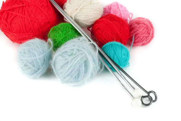 Clews and knitting needles — Stock Photo, Image