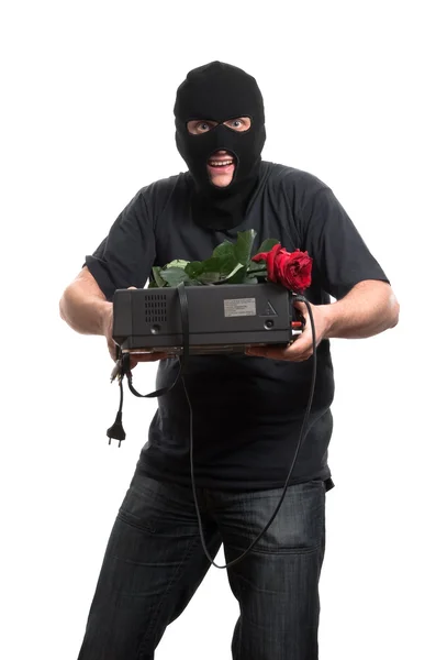 Happy robber with a gift — Stock Photo, Image
