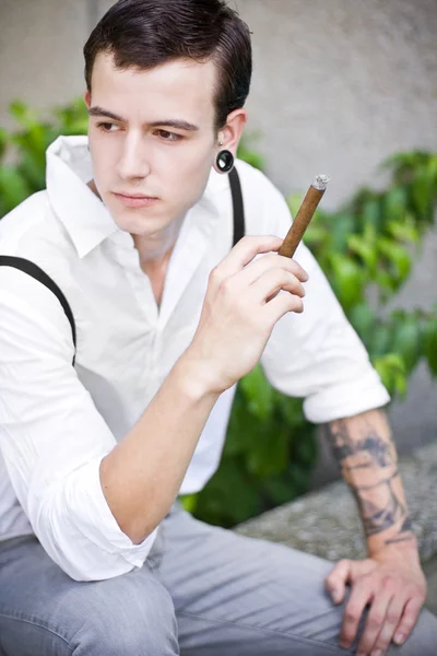 stock image Man thinks while smoking cigar