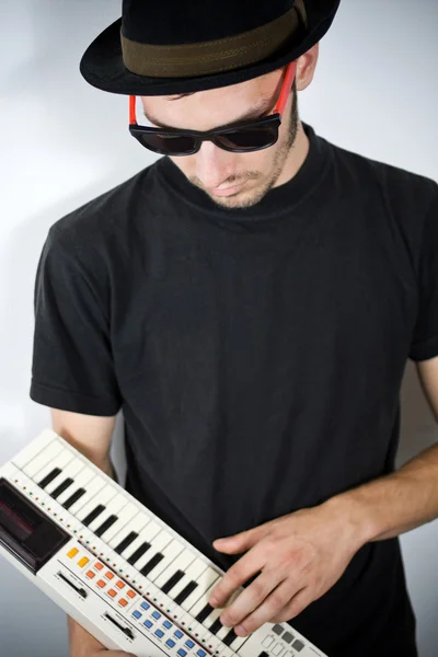 Stock image Cool guy playing keyboard