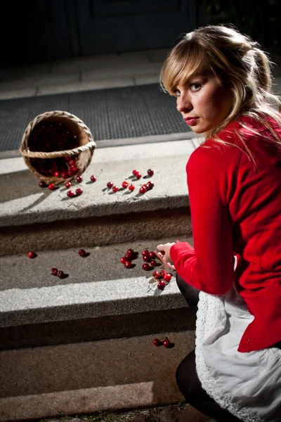 Woman dropped her cherry basket — Stock Photo, Image