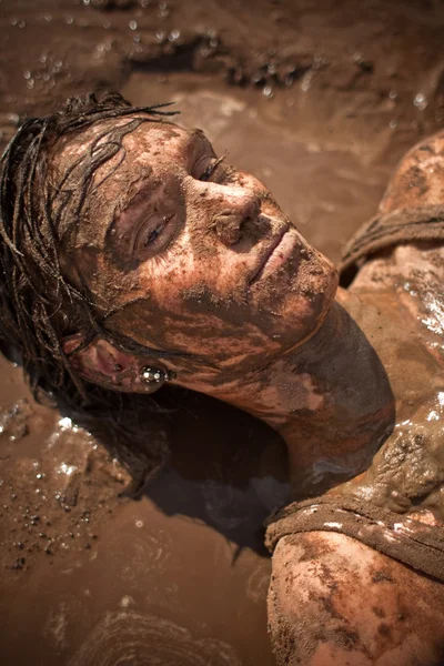stock image Woman in the mud