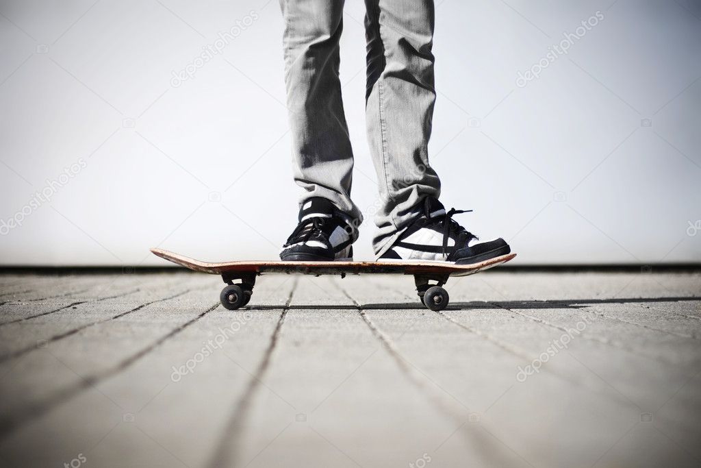 Skater standing on his skateboard