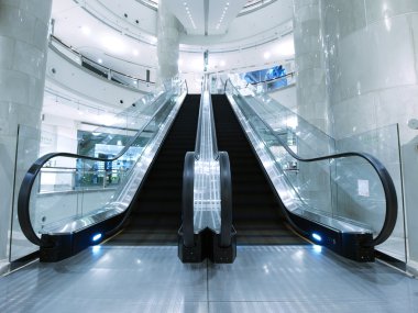 Escalator in department store clipart