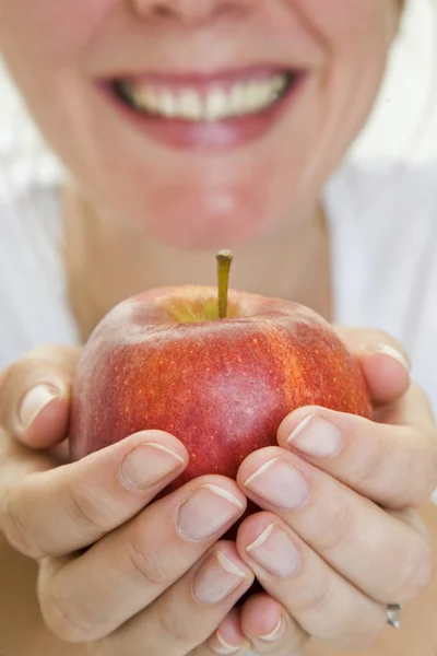 Manzana y sonrisa Fotos De Stock