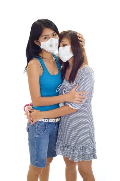 Ženy s ochrannými maskami — Stock fotografie