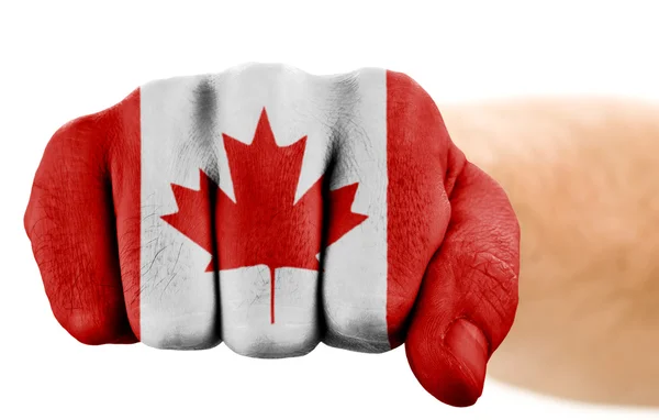 Pięść z kanadyjską flagę na białym tle — Zdjęcie stockowe