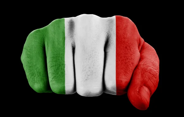 Кулак с итальянским флагом — стоковое фото