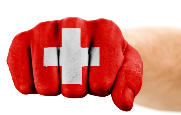 Faust mit Schweizer Flagge isoliert auf weißer — Stockfoto