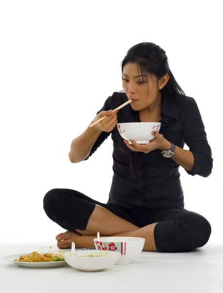 절단 지팡이 함께 먹는 아시아 여자 — 스톡 사진