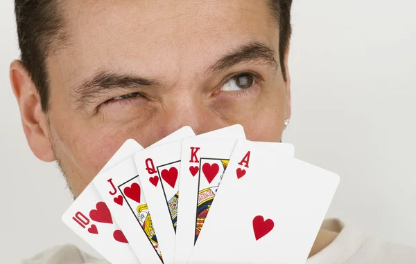 Homem escondido atrás de cartas — Fotografia de Stock