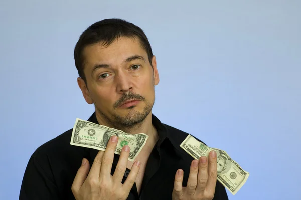Man holding dollars — Stock Photo, Image