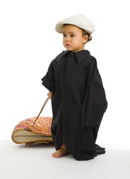 Menina com camisa enorme, saco e chapéu — Fotografia de Stock