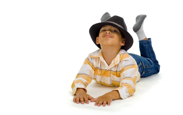 Aranyos fiú padló fektetése Stock Fotó